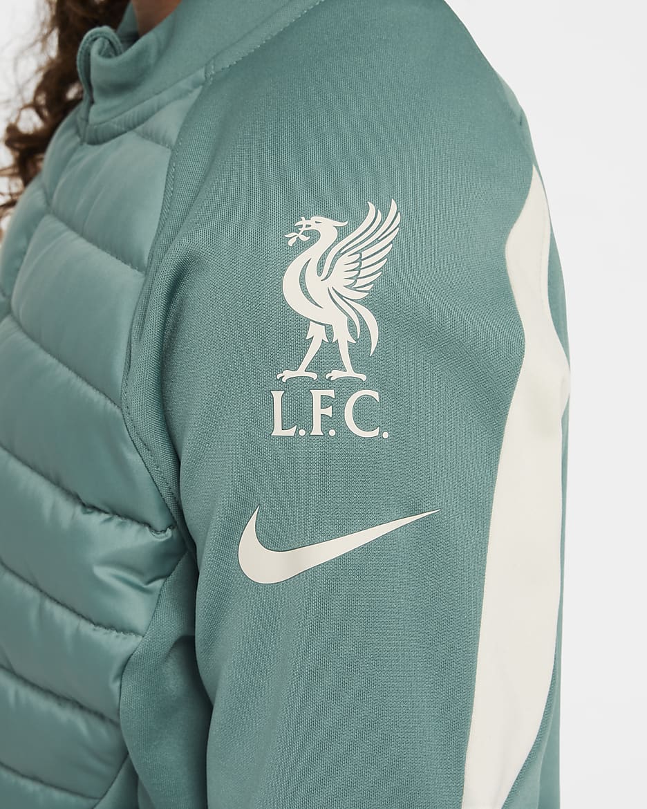 Liverpool F.C. Academy Winter Warrior Older Kids Nike Therma FIT Football Drill Top. Nike IE